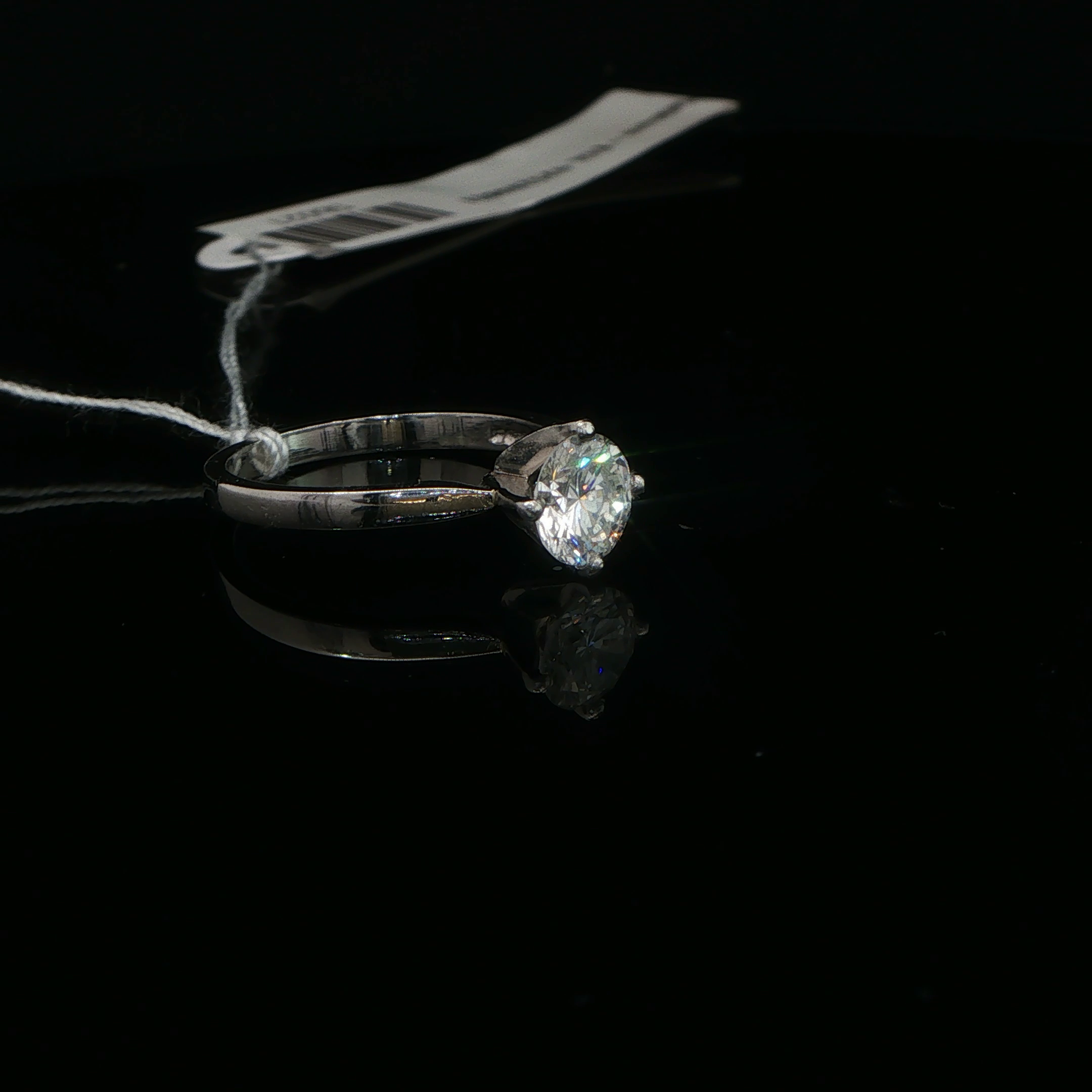 Four-Prong Diamond Solitaire Ring in Platinum