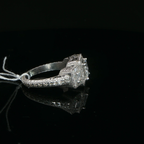 Palladium Three-Stone Princess Diamond Halo Ring