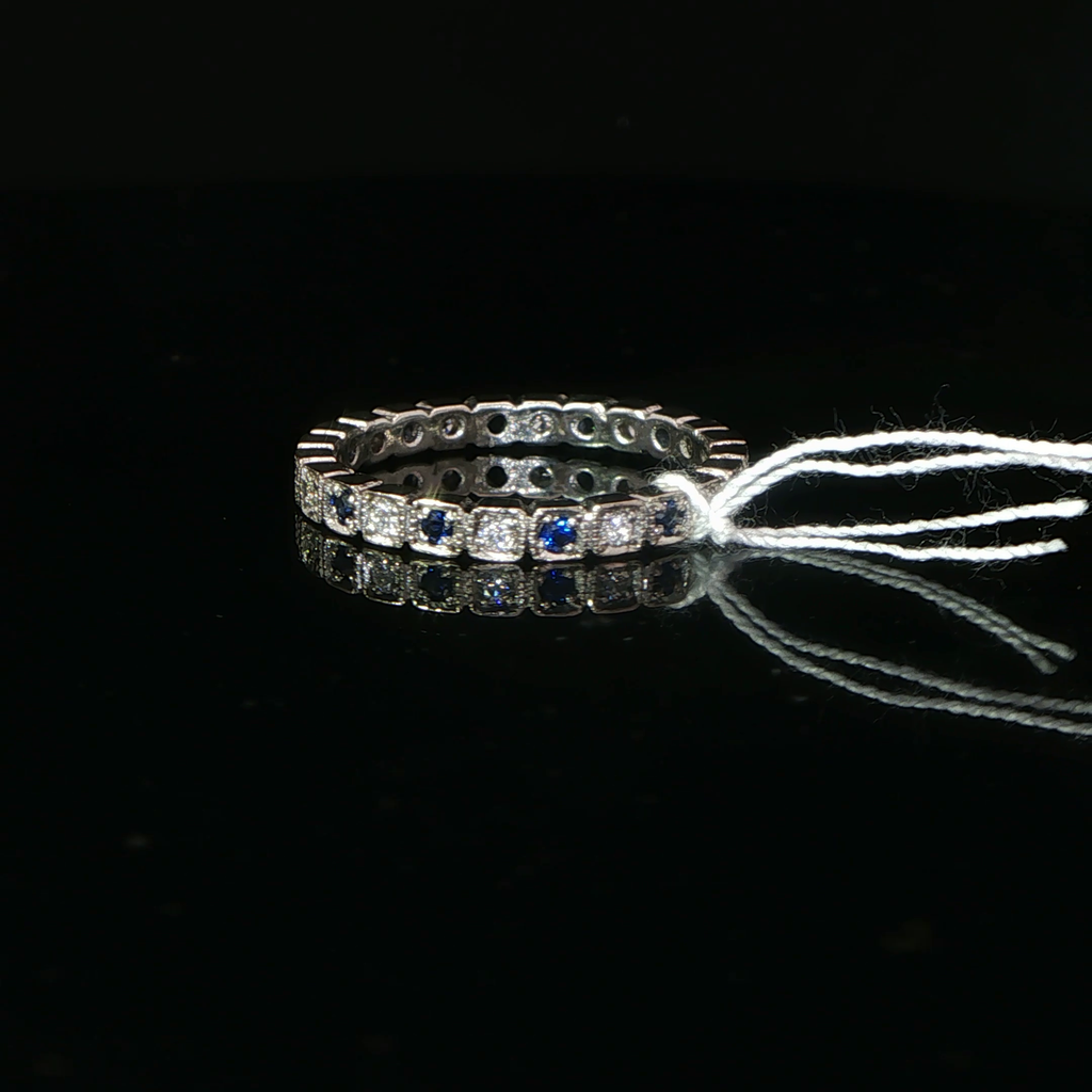 Alternating Deep Blue Sapphire And Diamond Eternity Ring in Platinum
