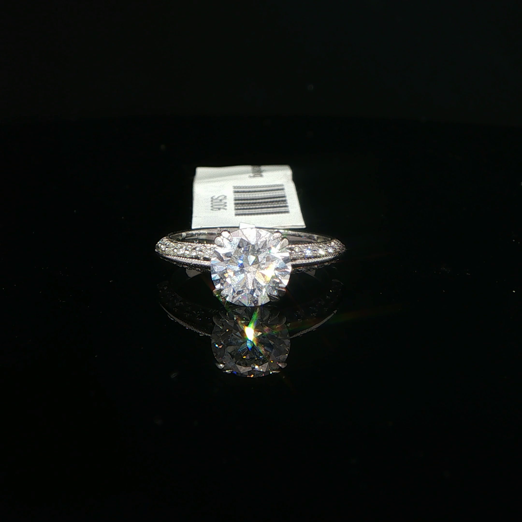 Round Diamond Solitaire Ring with Accented Platinum Band