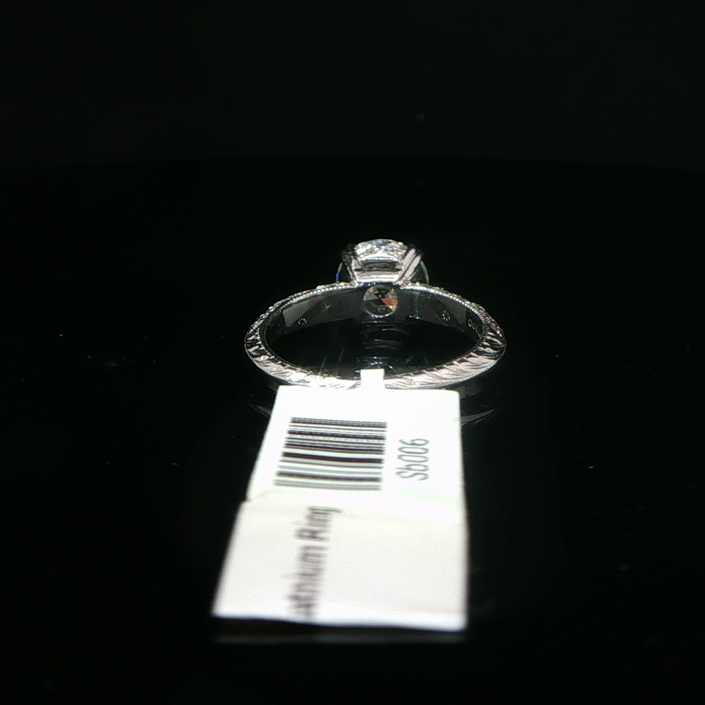 Round Diamond Solitaire Ring with Accented Platinum Band