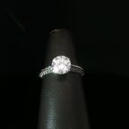 Round Diamond Solitaire Ring with Accented Platinum Band