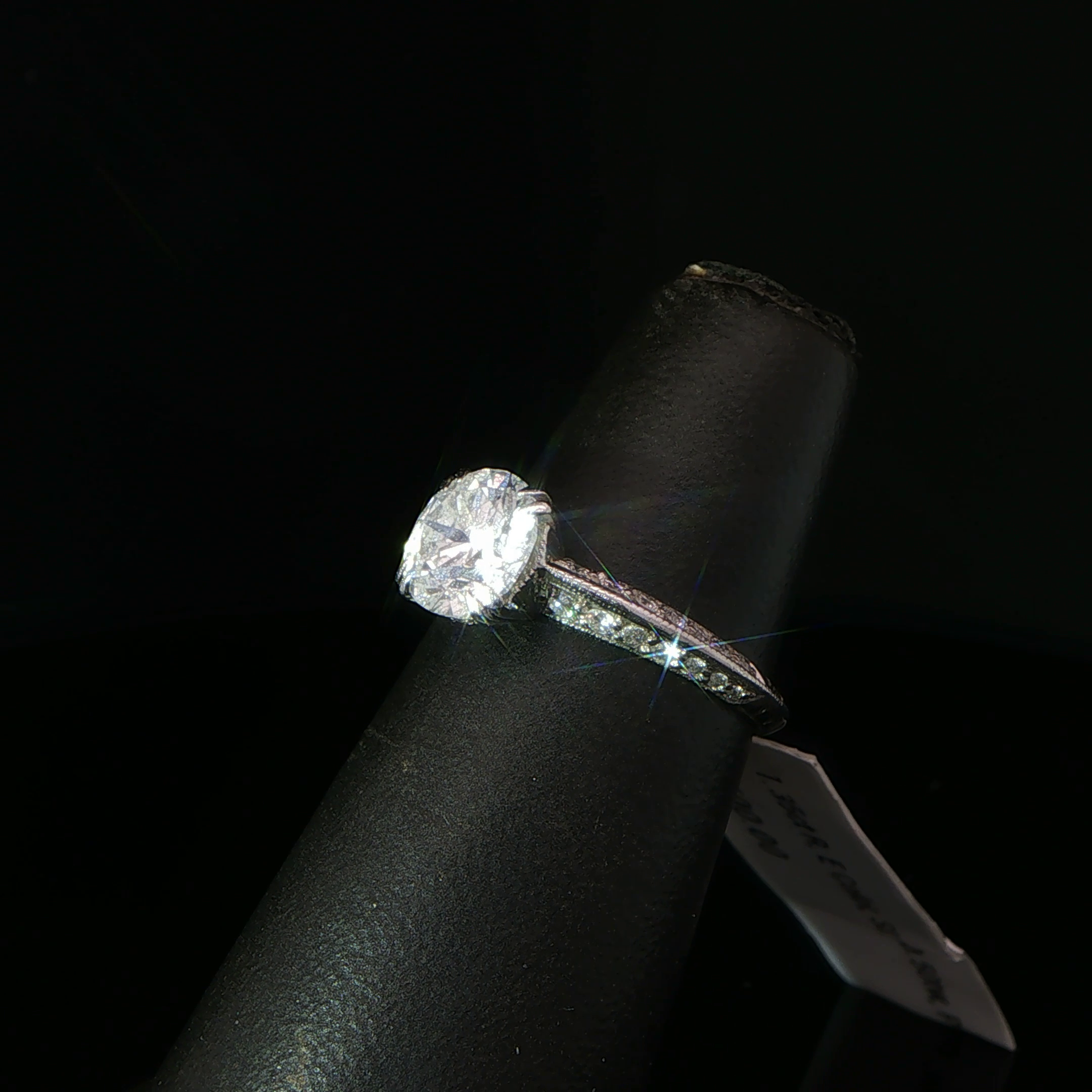 Round Diamond Solitaire Ring with Accented Platinum Band