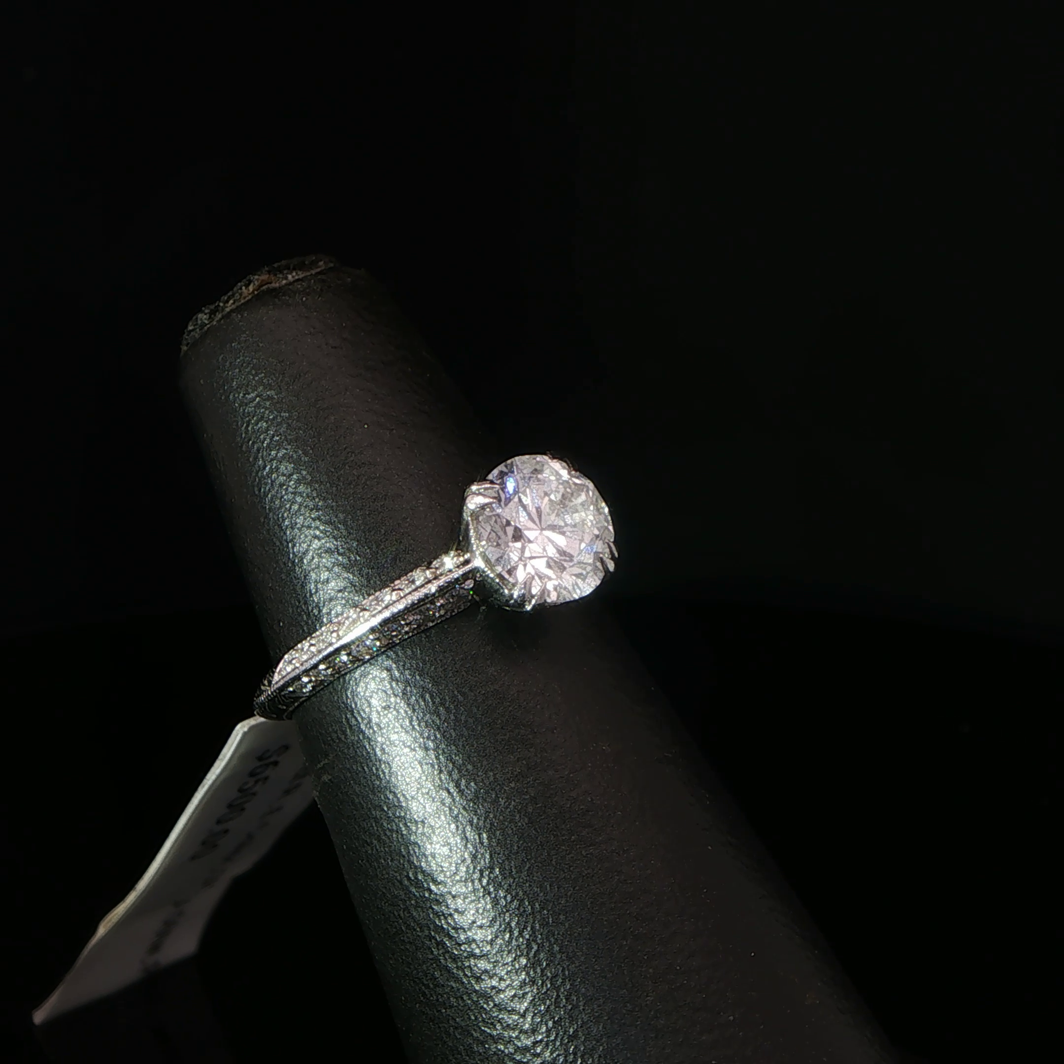 Round Diamond Solitaire Ring with Accented Platinum Band