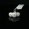 Three-Stone Diamond Halo Ring in Palladium
