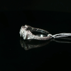 Three-Stone Diamond Halo Ring in Palladium