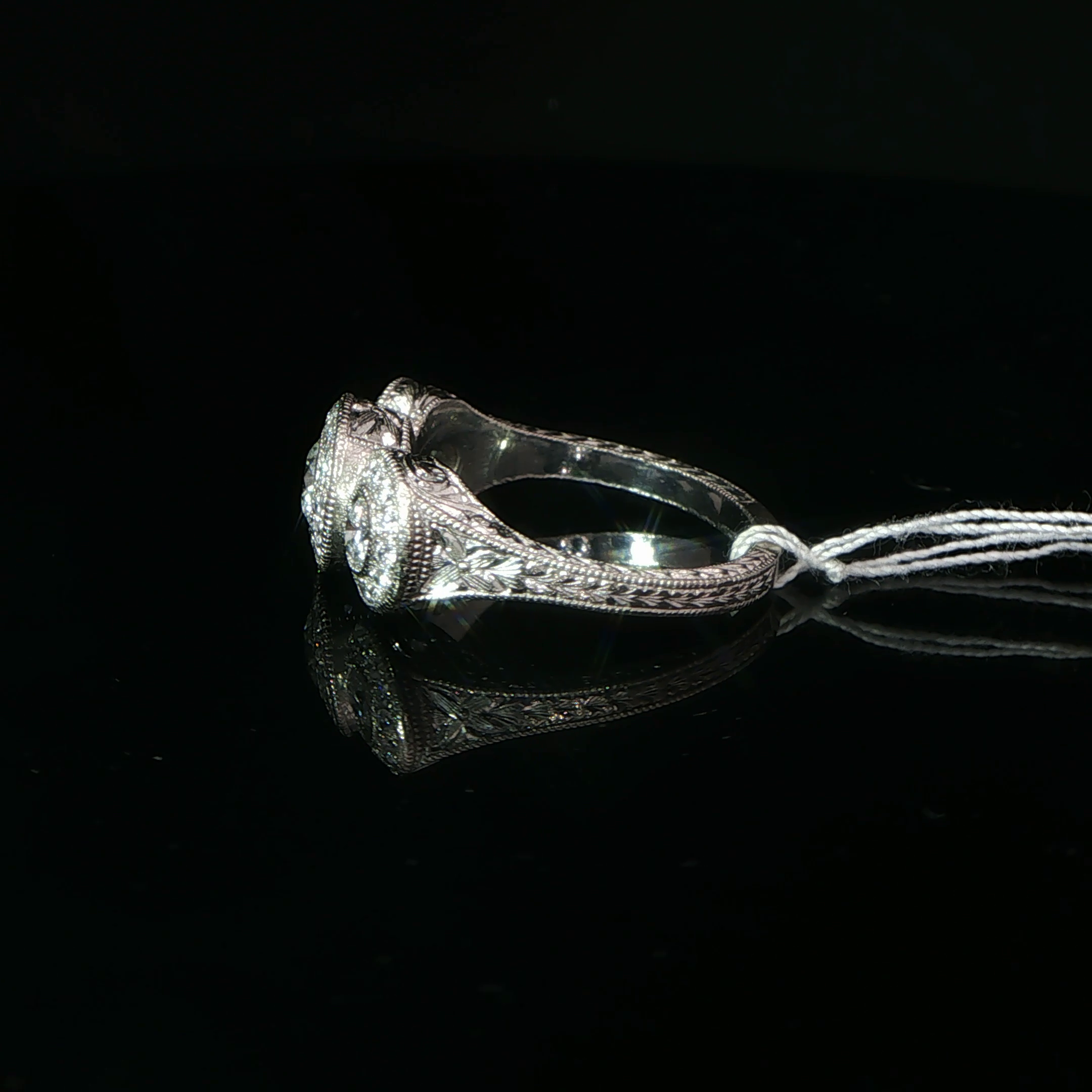 Three-Stone Diamond Halo Ring in Palladium