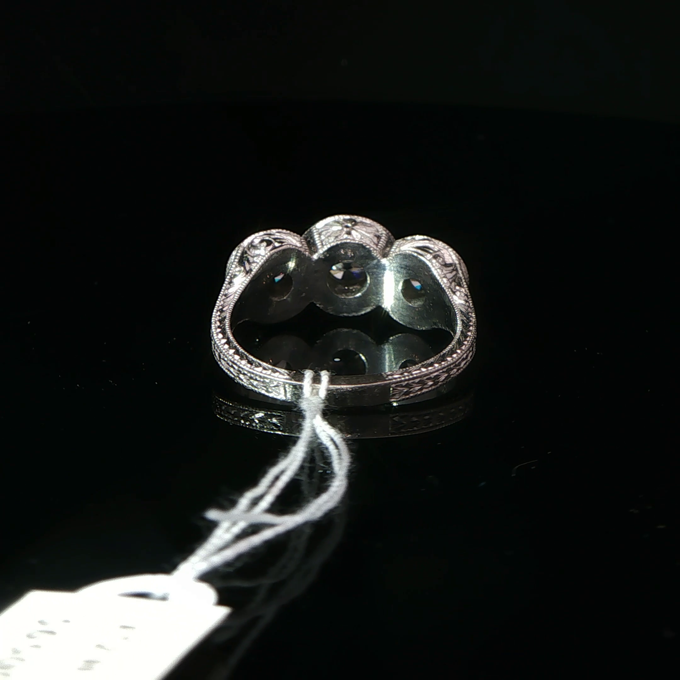 Three-Stone Diamond Halo Ring in Palladium