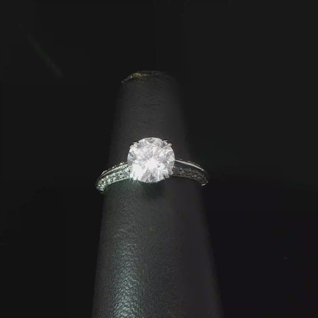 Round Diamond Solitaire Ring with Accented Platinum Band