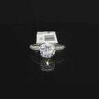Round Diamond Solitaire Ring with Accented Platinum Band